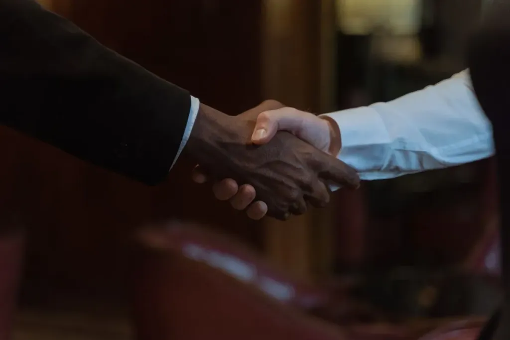 A handshake closing an agreement